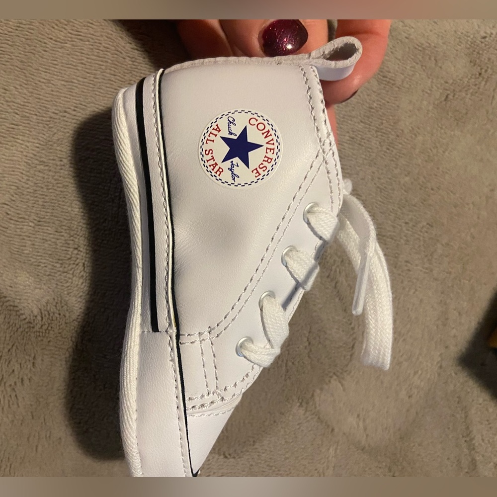 Baby white converse shoes